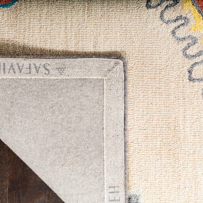 SAFAVIEH Handmade Micro-Loop Noeleen Wool Rug