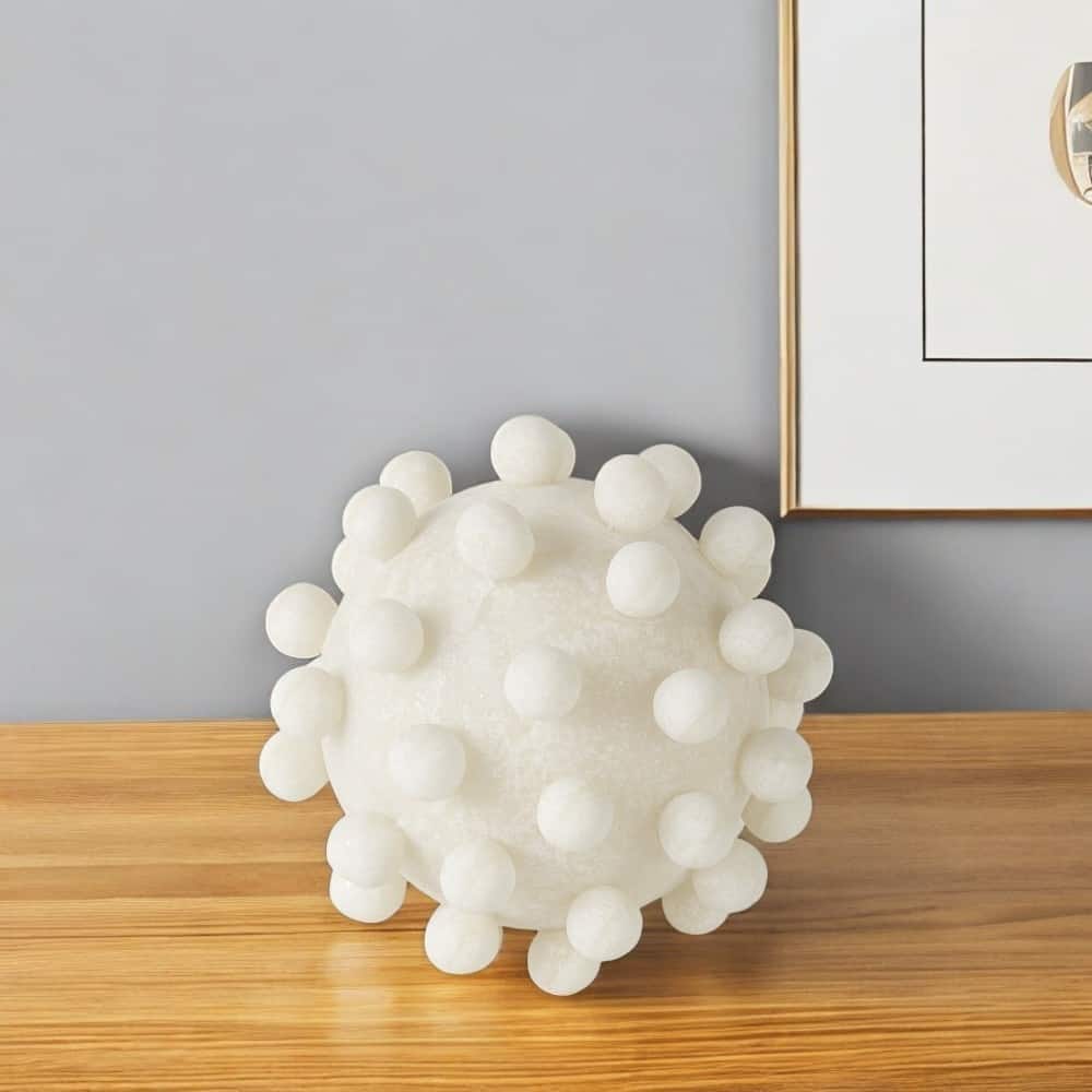 HomeRoots 6" Ivory Resin Knobby Nubs Orb Tabletop Sculpture