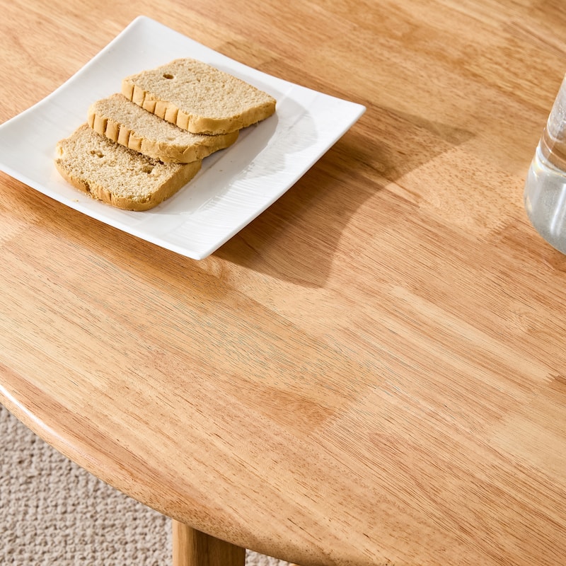 wooden coffee table with faux rattan accents