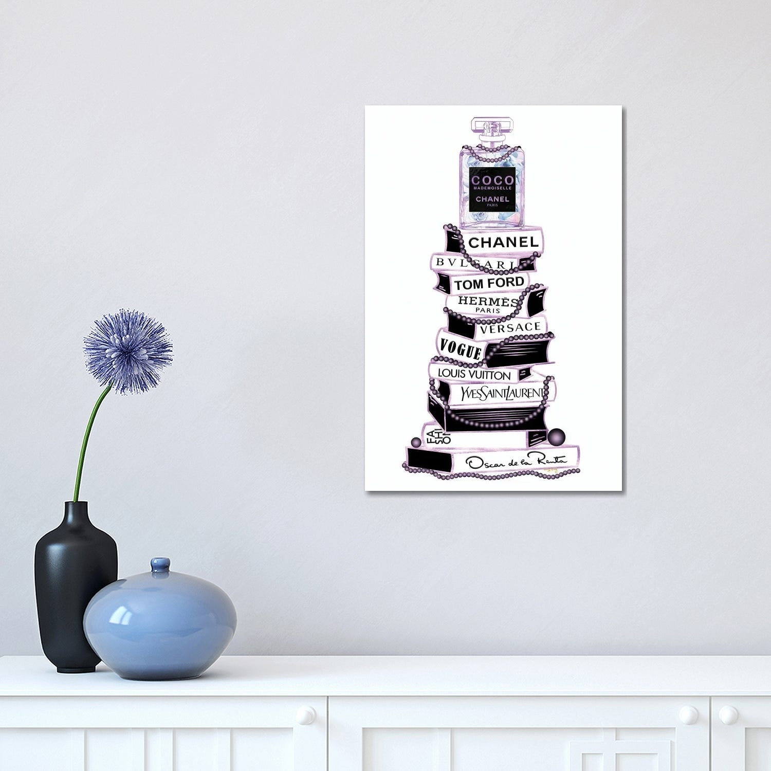 Purple & Black Mademoiselle Perfume Bottle On Extra Tall Book Stack