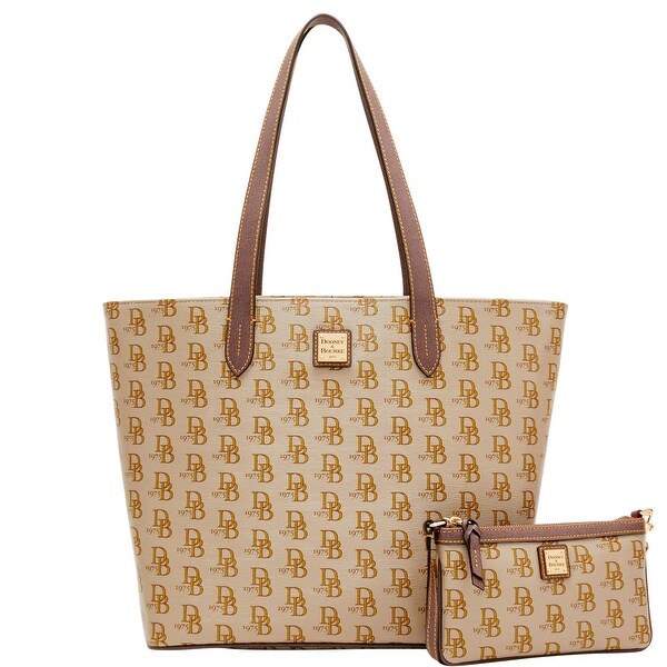 Dooney Bourke 1975 Db Signature Lg Zip Per Slim Dooney Bourke 1975 Db Signature Lg Zip Per Slim Wristlet Introduced