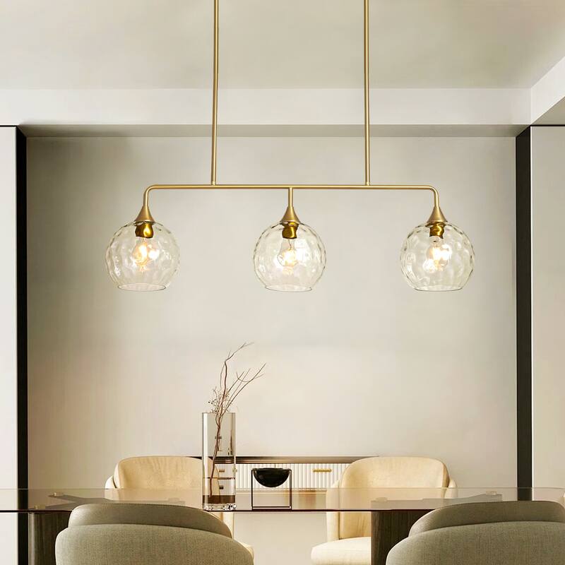 3-Light Modern Black/Brushed Gold Linear Chandelier for Kitchen Island with Clear Textured Glass Globe Shades