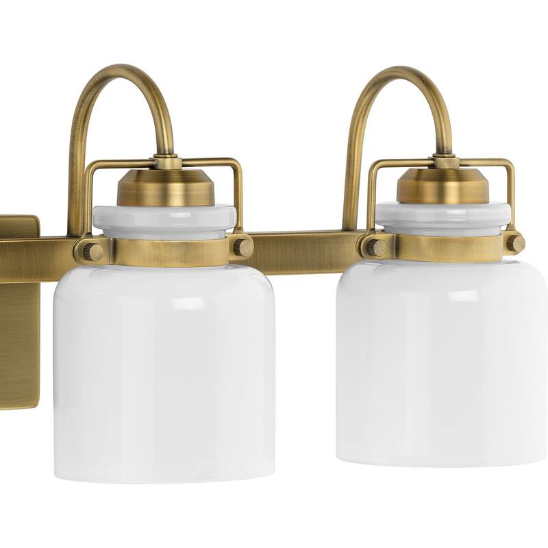 Fessler Collection Four-Light Vintage Brass Opal Glass Farmhouse Bath Light - 29.12 in x 7.12 in x 9.12 in