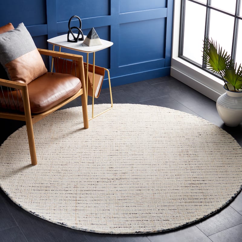SAFAVIEH Handmade Abstract Lottie Modern Wool Rug - 4' Round - Ivory/Blue - Round