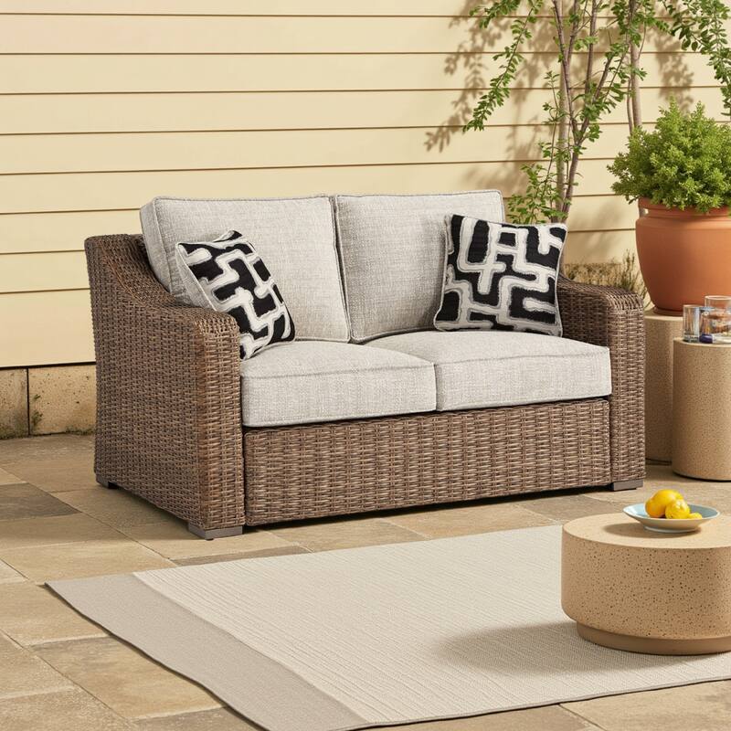 Tira Outdoor Loveseat, 57 Inch Handwoven Resin Wicker, Beige, Pillows