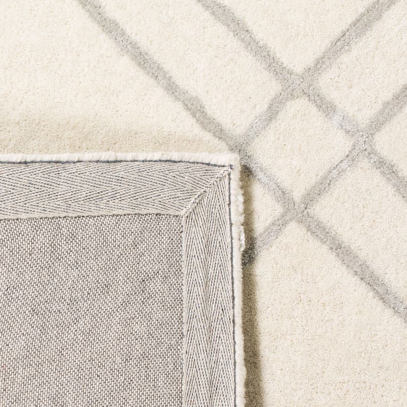 SAFAVIEH Handmade Himalaya Beadwork Modern Wool Rug