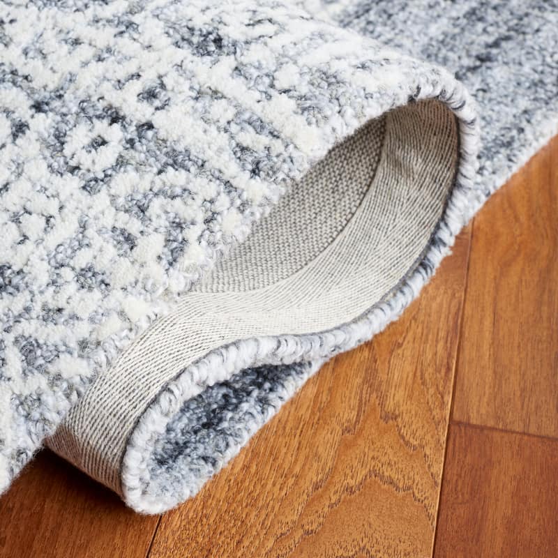 SAFAVIEH Handmade Ebony Satoko Medallion Wool Rug