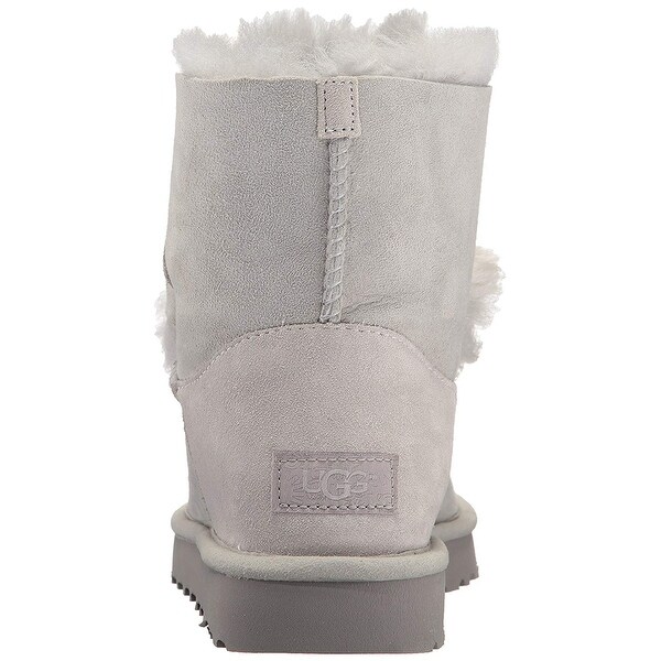 black ugg boots with pom poms