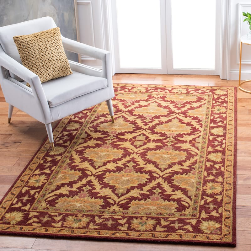 SAFAVIEH Handmade Antiquity Charis Traditional Oriental Wool Rug - 4' x 6' - Wine/Gold