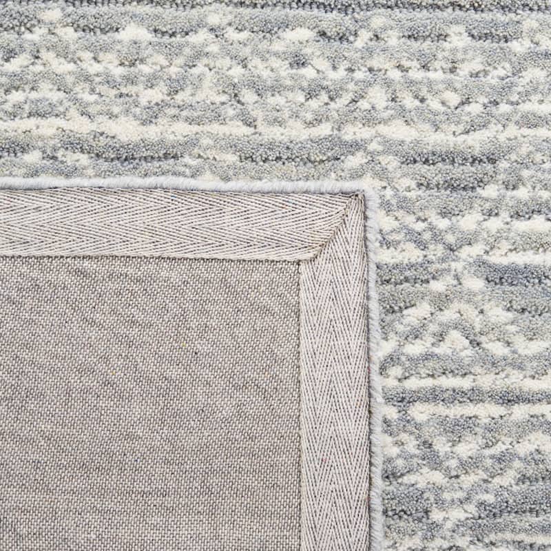 SAFAVIEH Handmade Abstract Edmonde Modern Tribal Wool Rug