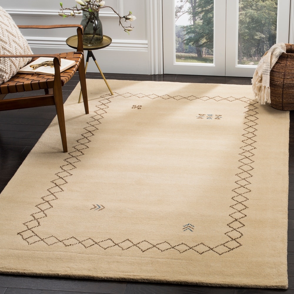 SAFAVIEH Handmade Himalaya Poppy Border Modern Hand-spun Wool Rug