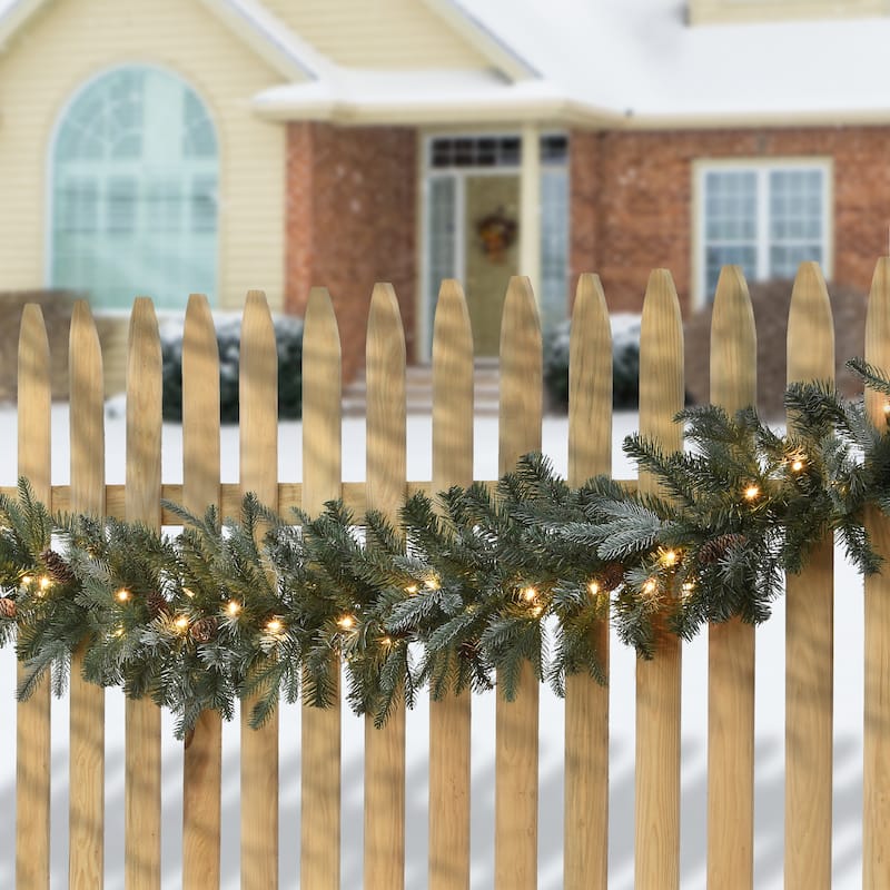 National Tree Company 9' x 12" "Feel Real" Frosted Arctic Spruce Garland 50 Clear Lights - 9 ft