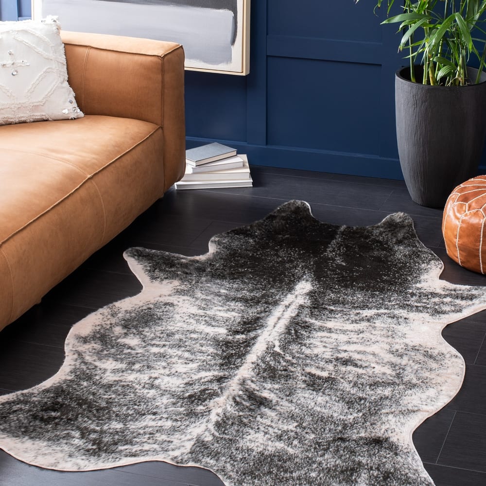 SAFAVIEH Faux Cow Hide Sinne Animal Rug