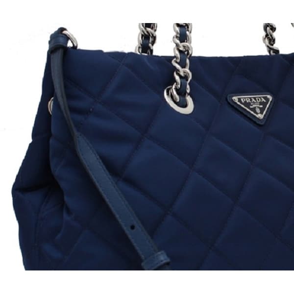 blue quilted bag