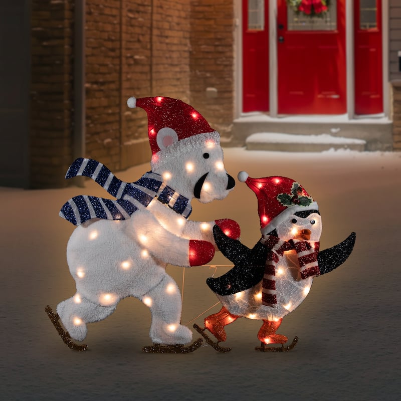 41.25" Lighted Ice Skating Polar Bear and Penguin Outdoor Christmas Decoration - Red