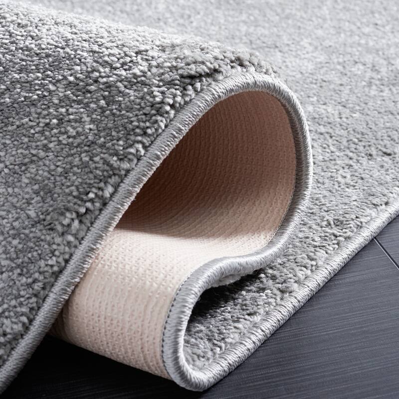 SAFAVIEH, Nonskid Gunde Solid Rug