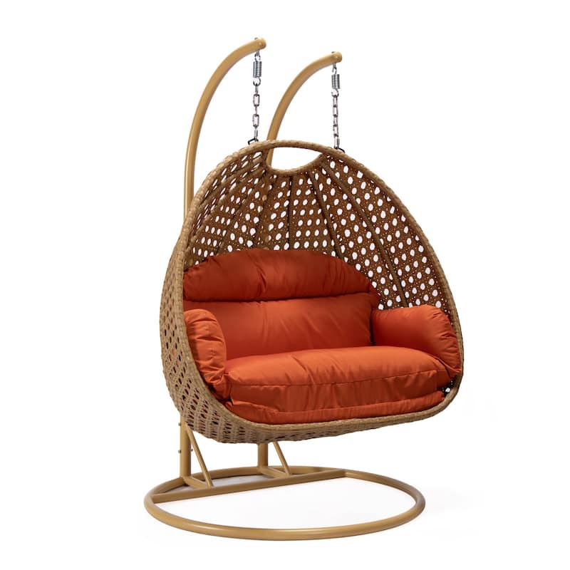 LeisureMod Mendoza 2-Person Hanging Egg Swing Chair - Handcrafted Light Brown Wicker, Patio Hammock Lounger with Cushions - 53"