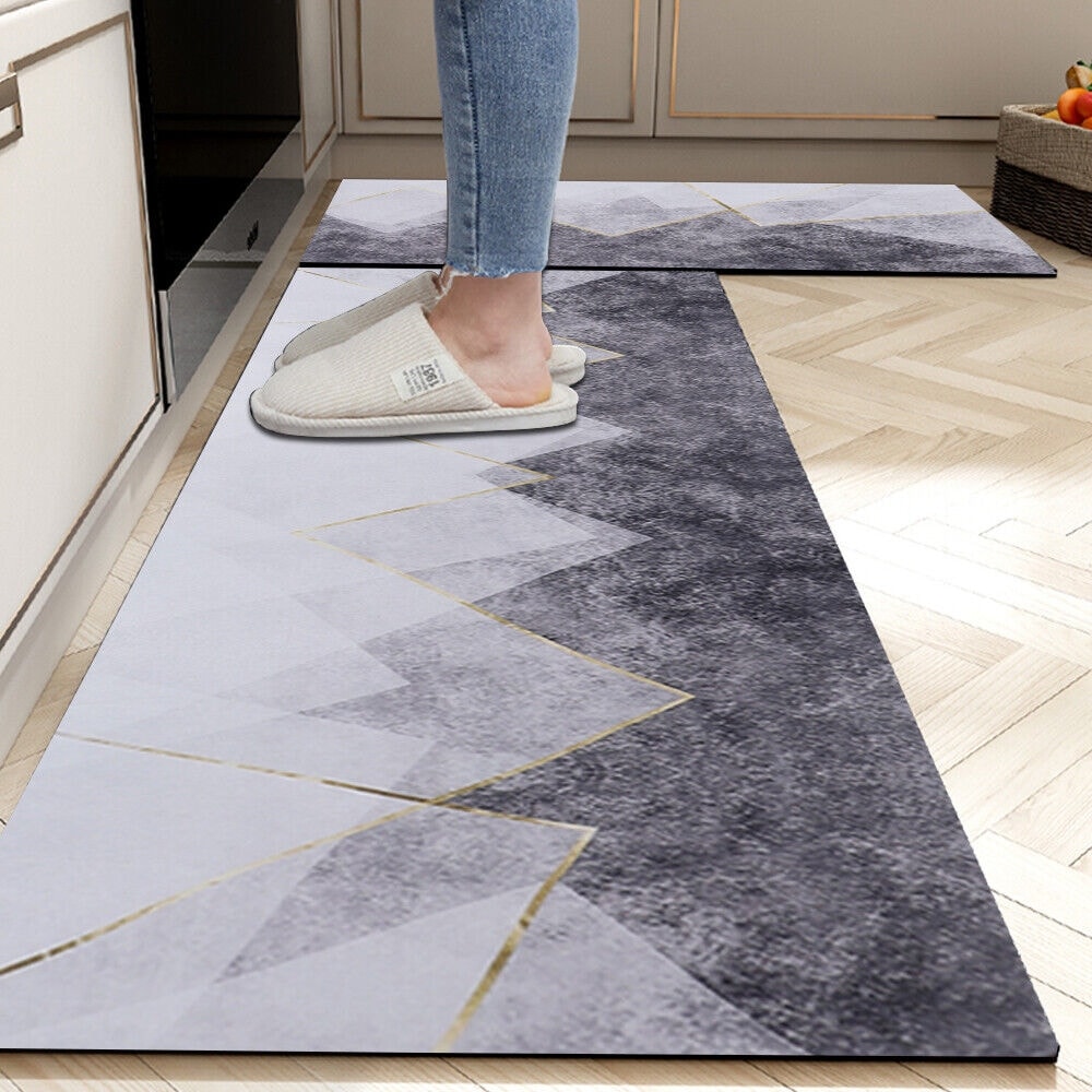 https://ak1.ostkcdn.com/images/products/is/images/direct/74c18885670681007a04f87c70075d4c3aff1715/2-Pcs-Waterproof-Anti-Fatigue-Kitchen-Mats-Non-Skid.jpg