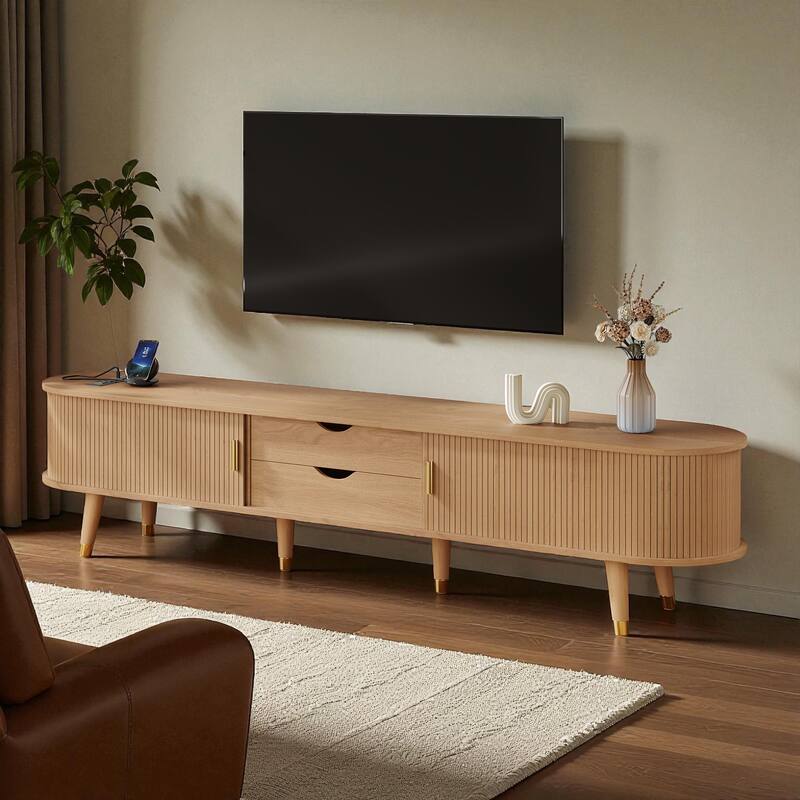74.8'' Mid-Century Wooden Oval Fluted TV Stand with Charging Station, Sliding Tambour Door & Drawers for 80'' TV - Natural