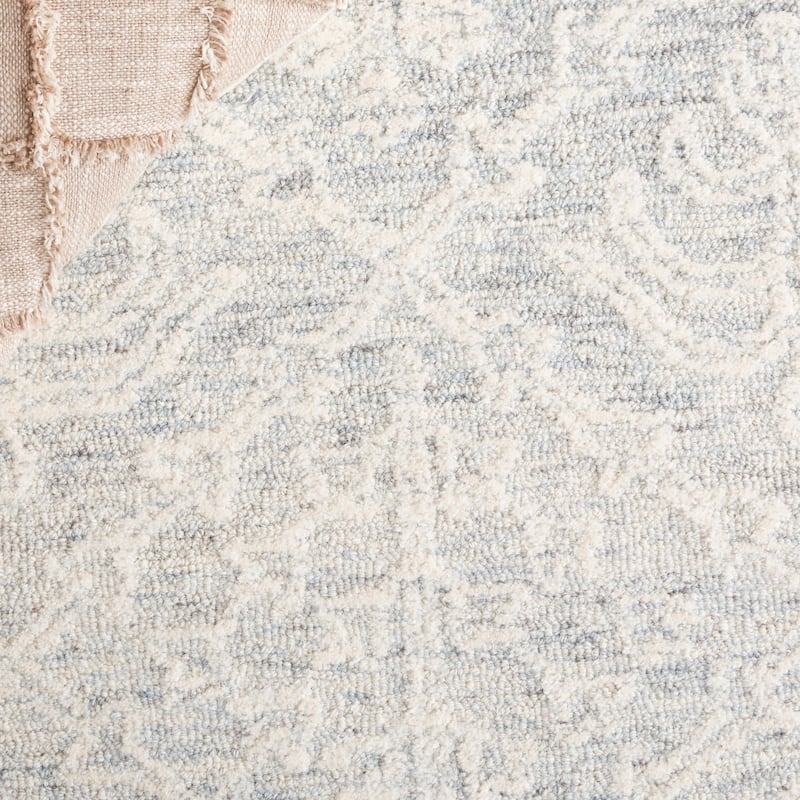 SAFAVIEH Handmade Ebony Leonoor Modern Wool Rug
