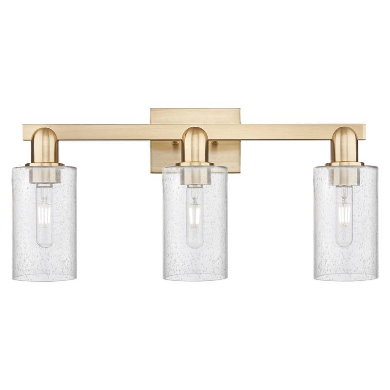 Innovations Lighting Endless Possibilities Arcadia - Clymer - 3 Light 23" Bath Vanity Light - Champagne Bronze/Seedy