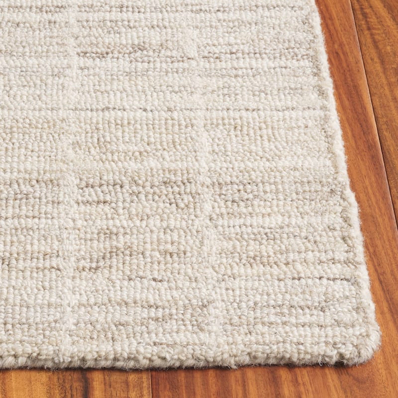 SAFAVIEH Handmade Ebony Peigi Contemporary Wool Rug
