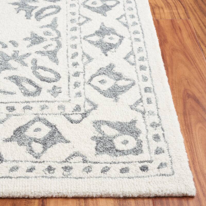 SAFAVIEH Handmade Ebony Bengta Modern Wool Rug