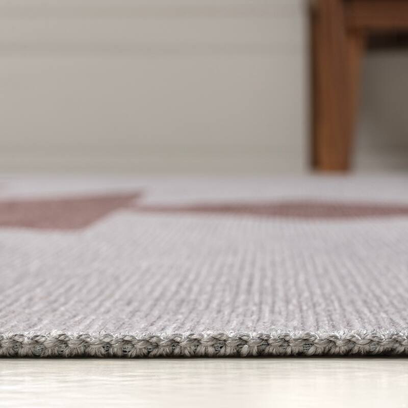 JONATHAN Y Adriel Solid Low-Pile Machine Washable Area Rug