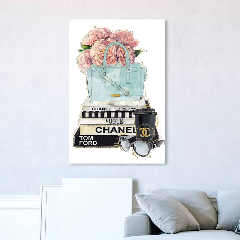 Wynwood Studio Fashion and Glam Blush Flowers Blue Purse and Books Light Pink Modern & Contemporary Wall Art Canvas Print - 45 x 30
