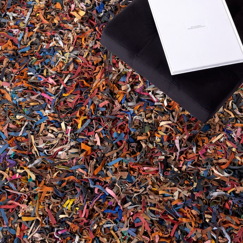 SAFAVIEH Handmade Leather Shag Carlijn Modern Leather Rug