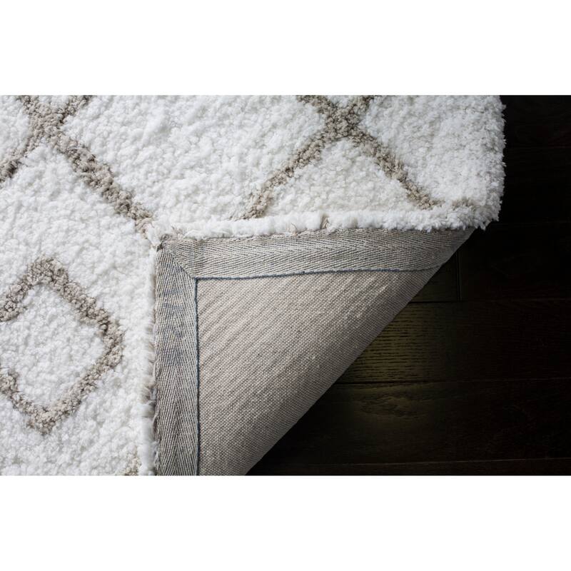 SAFAVIEH Handmade Toronto Shag Welmoet Polyester Rug