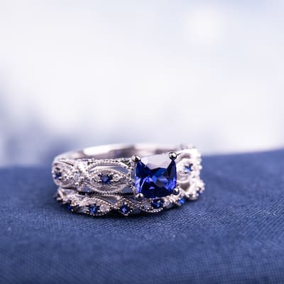 Miadora Signature Collection 10k White Gold Created Sapphire and 1/10ct TDW Diamond Bridal Set
