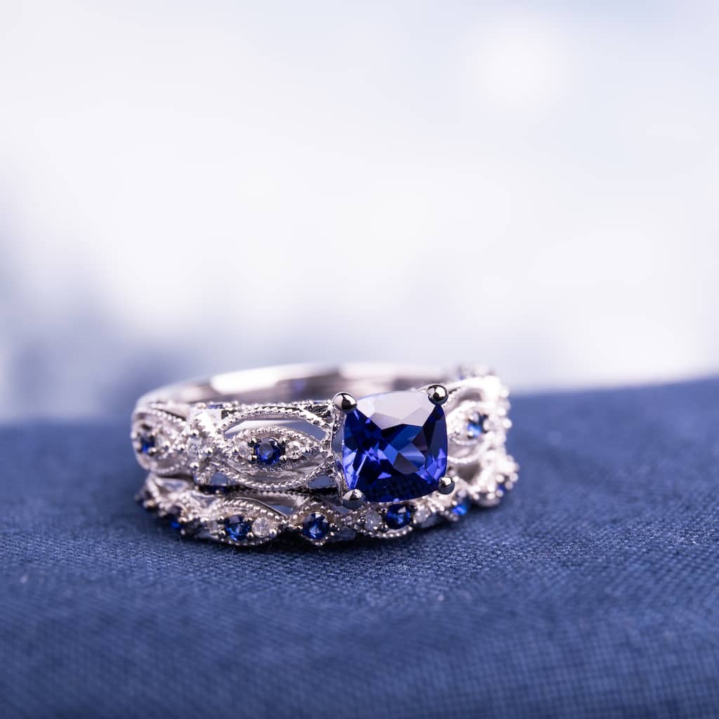Miadora Signature Collection 10k White Gold Created Sapphire and 1/10ct TDW Diamond Bridal Set