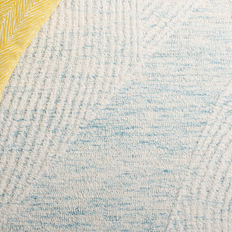 SAFAVIEH Handmade Pine Nevjana Modern Wool Rug