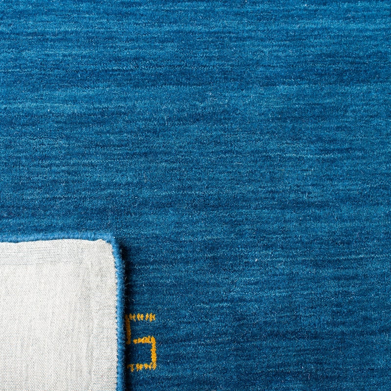 SAFAVIEH Handmade Himalaya Karly Modern Wool Rug