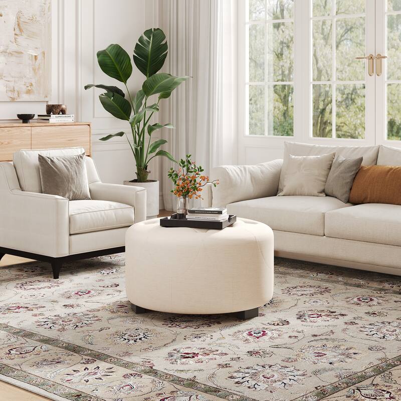 Round Upholstered Ottoman with Button Tufted Top and Wooden Legs