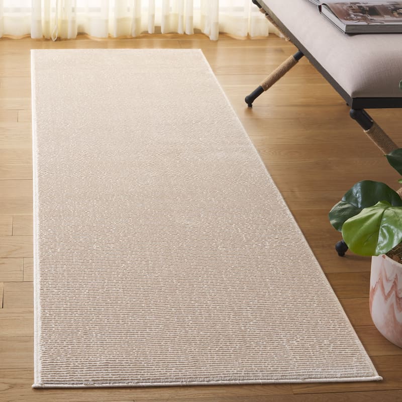 SAFAVIEH Revive Avie Solid Rug