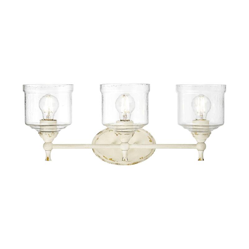 Keating 3 Light Bath Vanity in Antique Ivory with Hammered Water Glass Shade - White