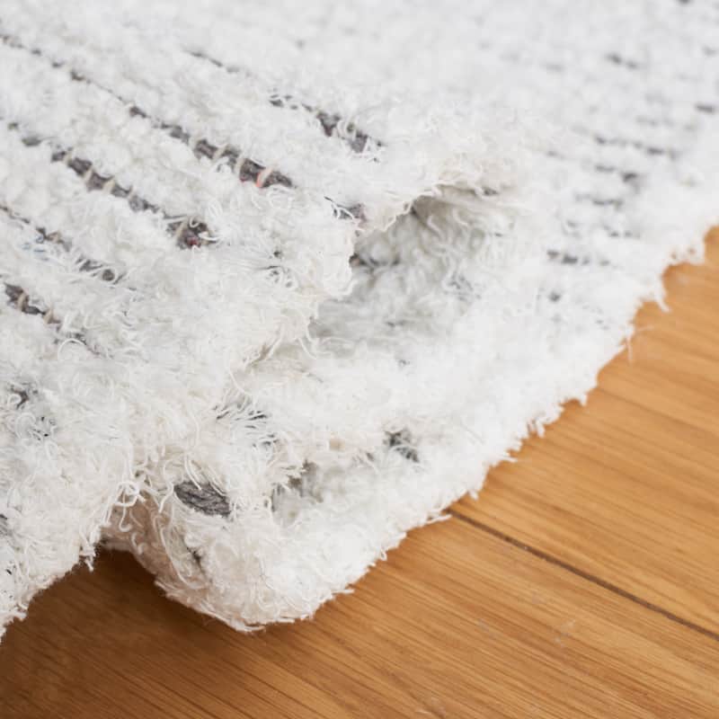 SAFAVIEH Handmade Casablanca Uljana Boho Cotton Fringe Rug