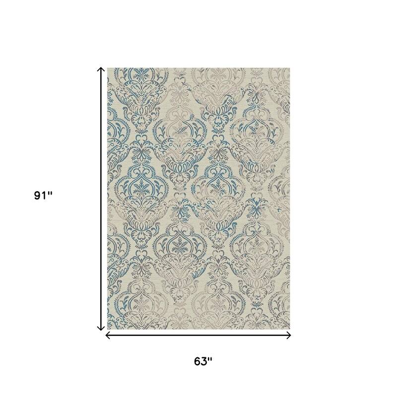 Guxo Distressed Stain Resistant Woven Area Rug By HomeRoots - 91' X '63' X '0.4