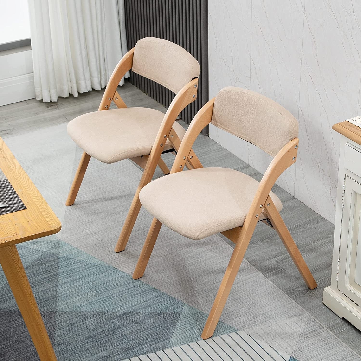 Upholstered folding 2025 dining chairs