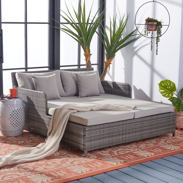 SAFAVIEH Outdoor Cadeo Wicker Daybed with Pillows and Cushions.