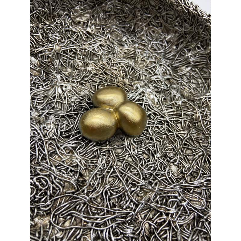 Silver Nest with Golden Eggs