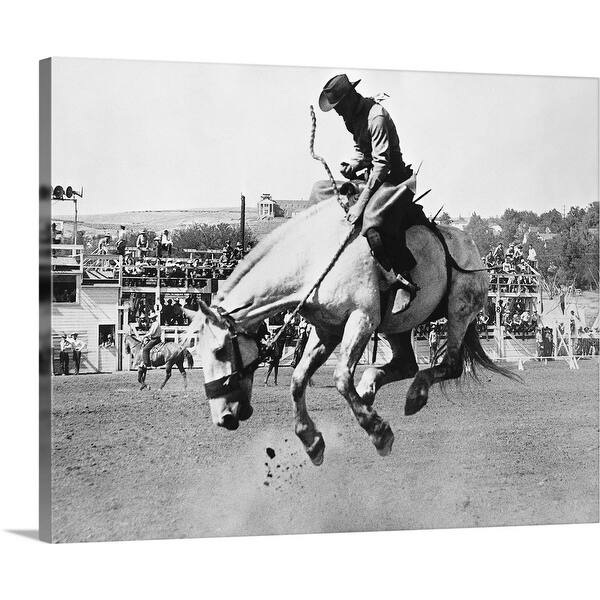 Shop Man Riding Bucking Horse In Rodeo Canvas Wall Art