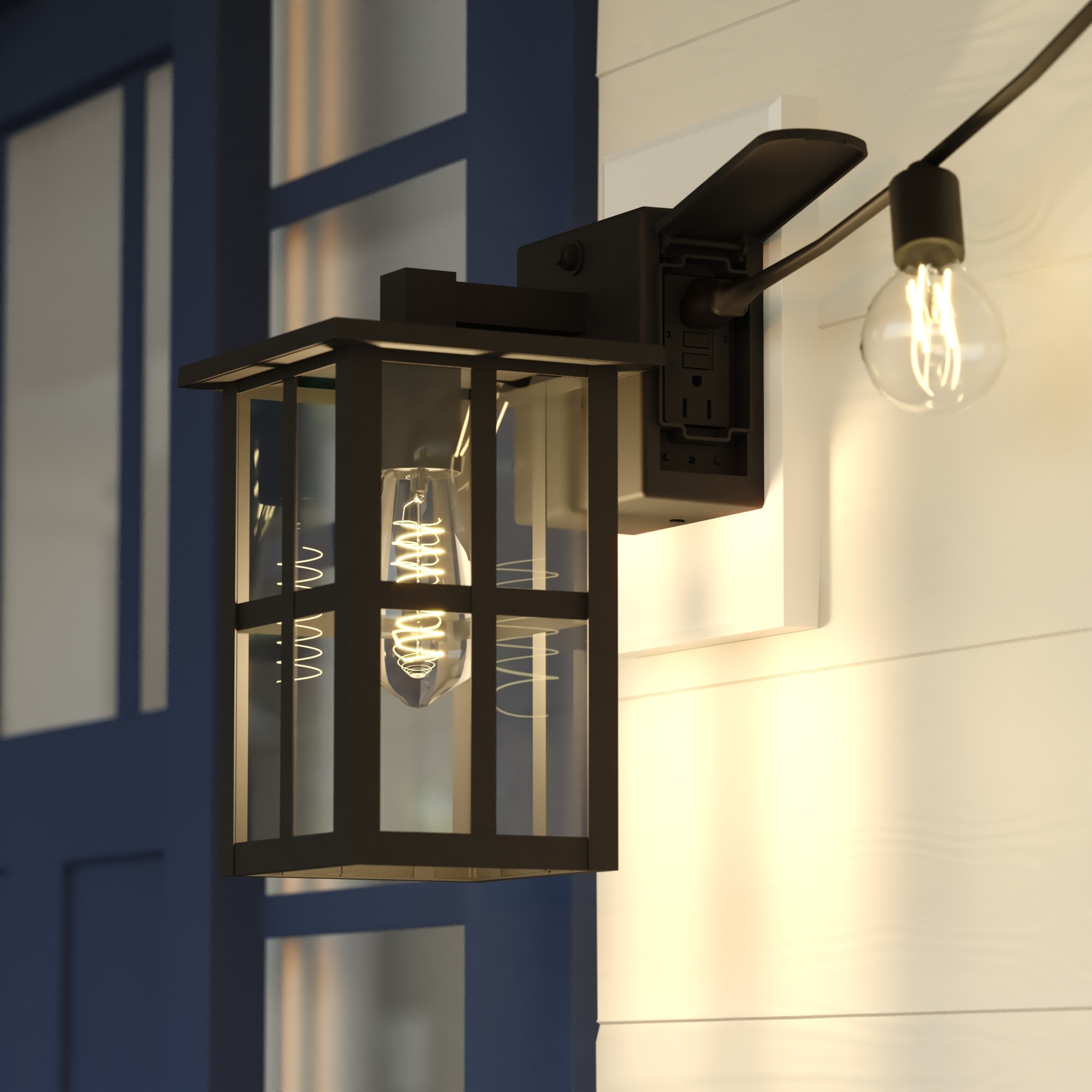 VAXCEL Maywood 11.5 in. H Black Dusk to Dawn Outdoor Wall Sconce Light with GFCI Outlet and Clear Glass Shade