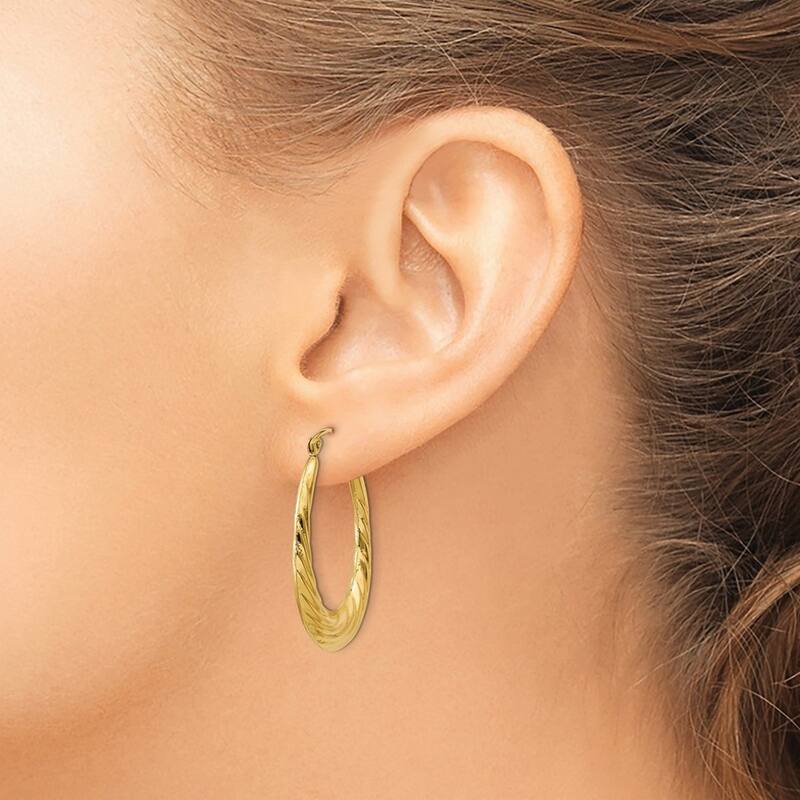 Curata 10k Yellow Gold Polished Twisted Oval Hollow Hoop Earrings - 32x22mm