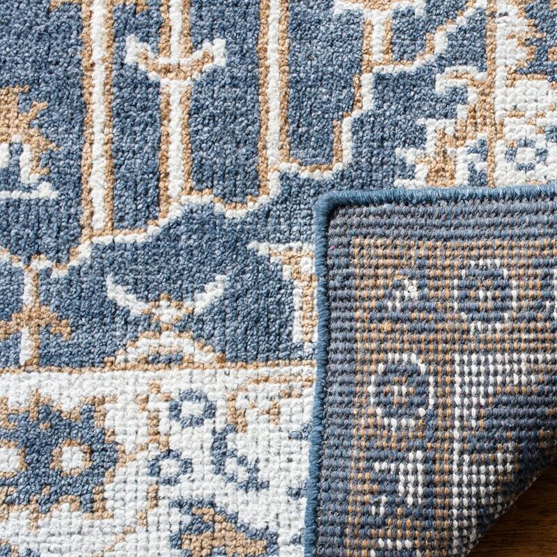 SAFAVIEH Hand-knotted Stone Wash Sigurjona Modern Wool Rug