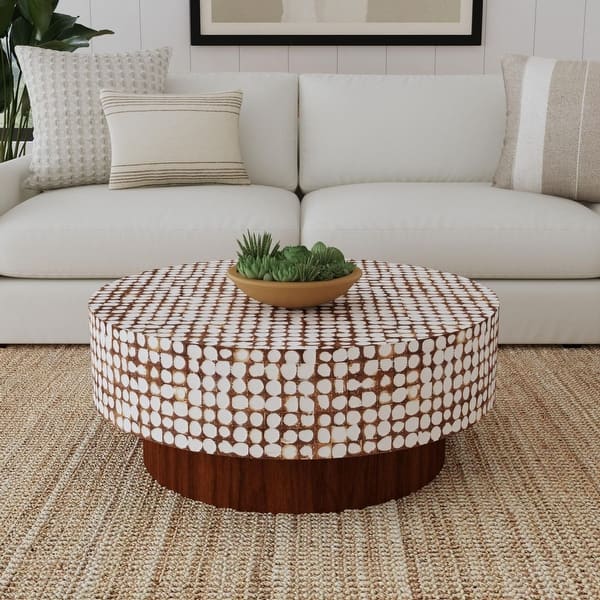 slide 2 of 11, Mila Coconut Shell Round Pedestal Coffee Table by East at Main White