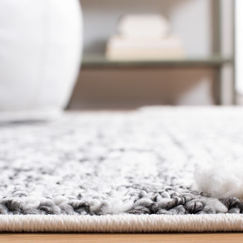 SAFAVIEH Moroccan Tassel Shag Chrystal 2-inch Thick Rug