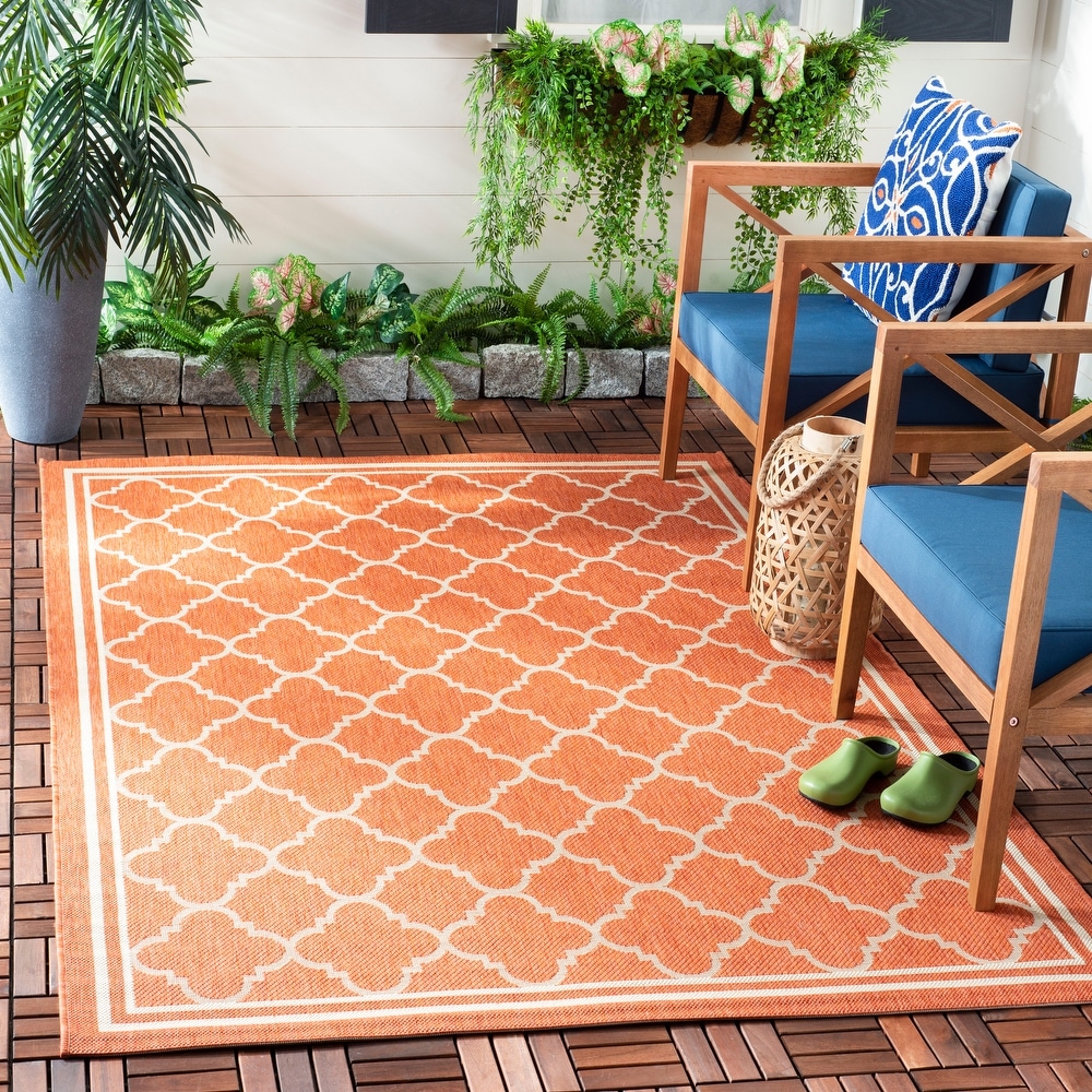 Orange store outdoor rug